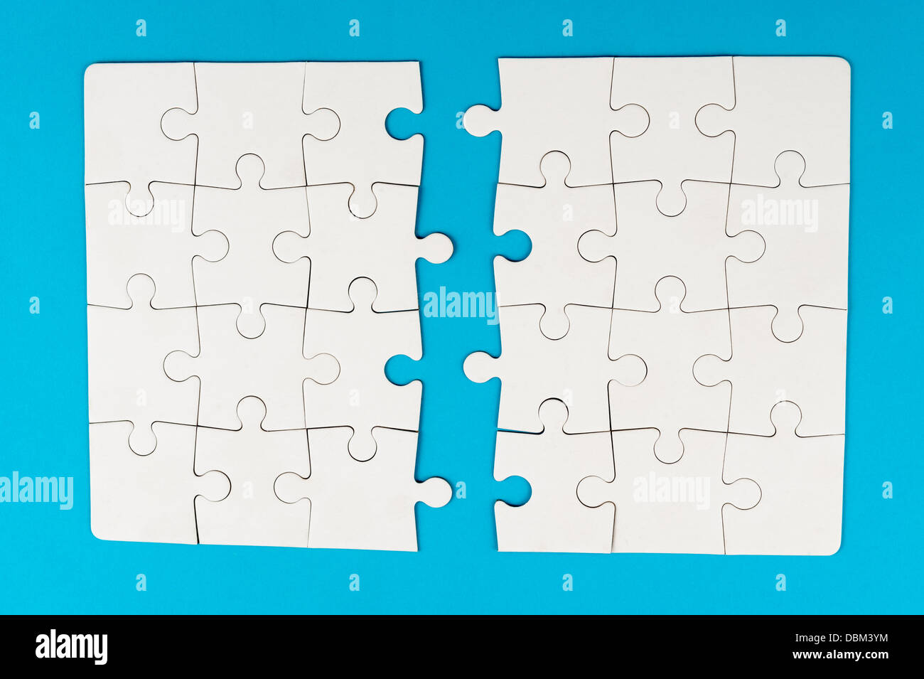Group of white paper jigsaw puzzles Stock Photo Alamy