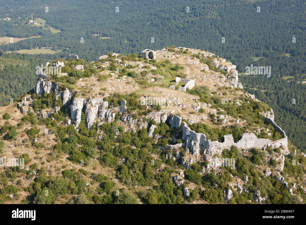 AERIAL VIEW. Ruins of an ancient settlement on a flat-top mountain. Castellaras of Thorenc, Alpes-Maritimes, French Riviera's hinterland, France. Stock Photo