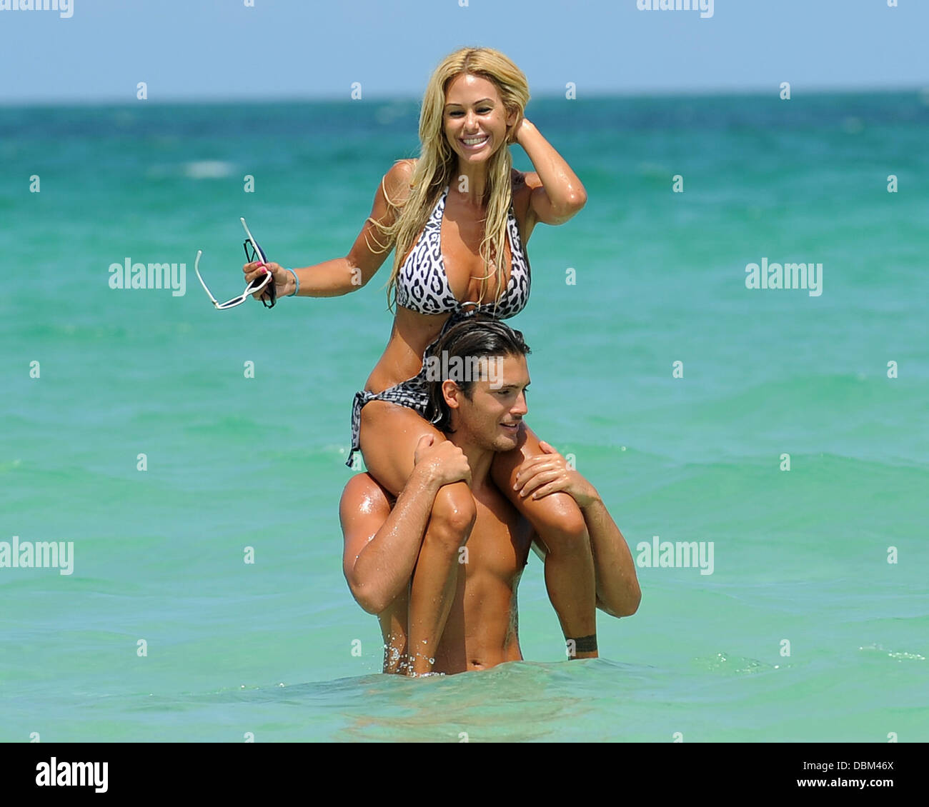 Shauna Sand and current boyfriend Laurent Homburger spending the day  together at the beach Miami Beach, Florida - 14.07.11 Stock Photo - Alamy