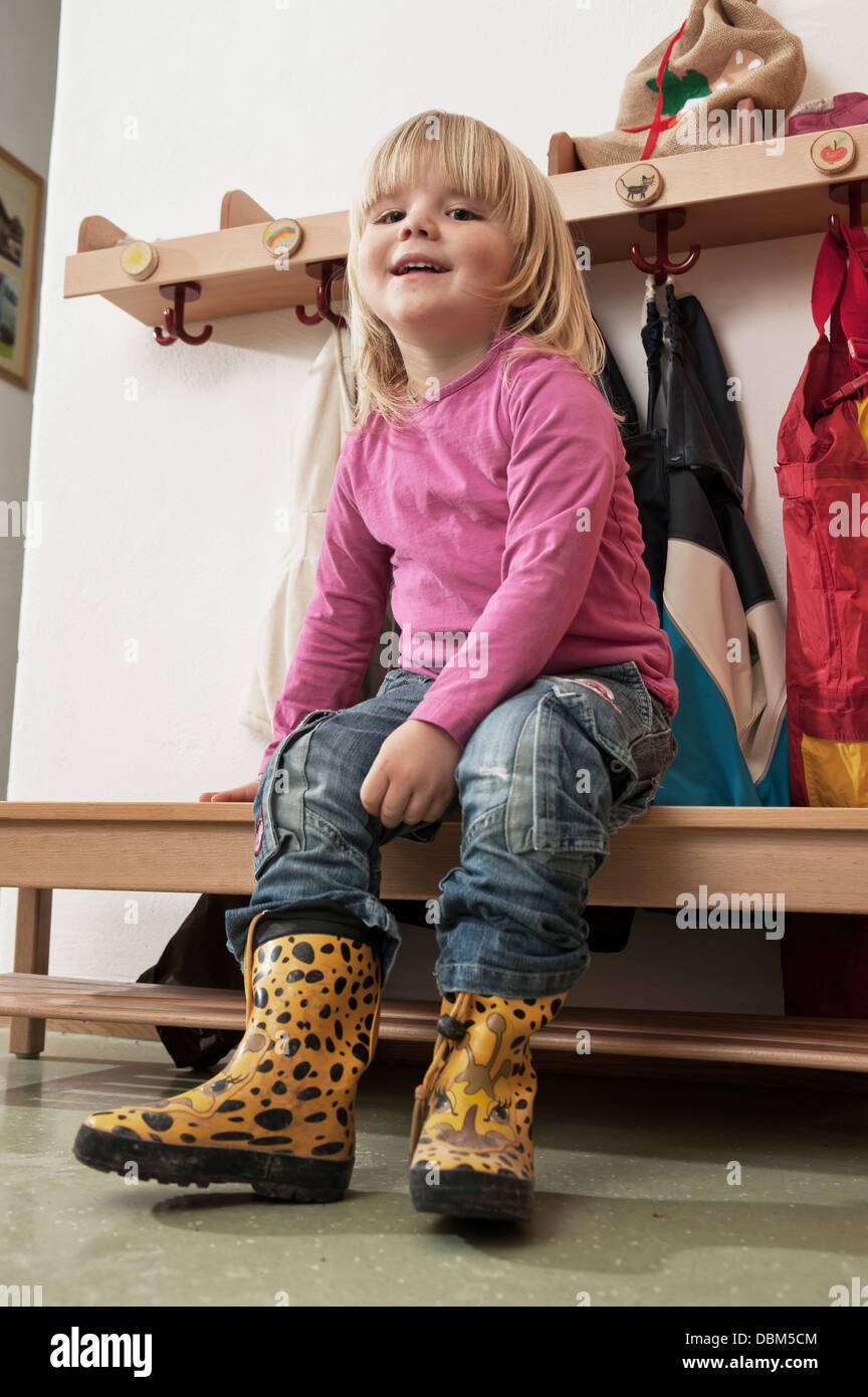 Little Girl Sitting On Bench In Nursery School, Kottgeisering, Bavaria ...