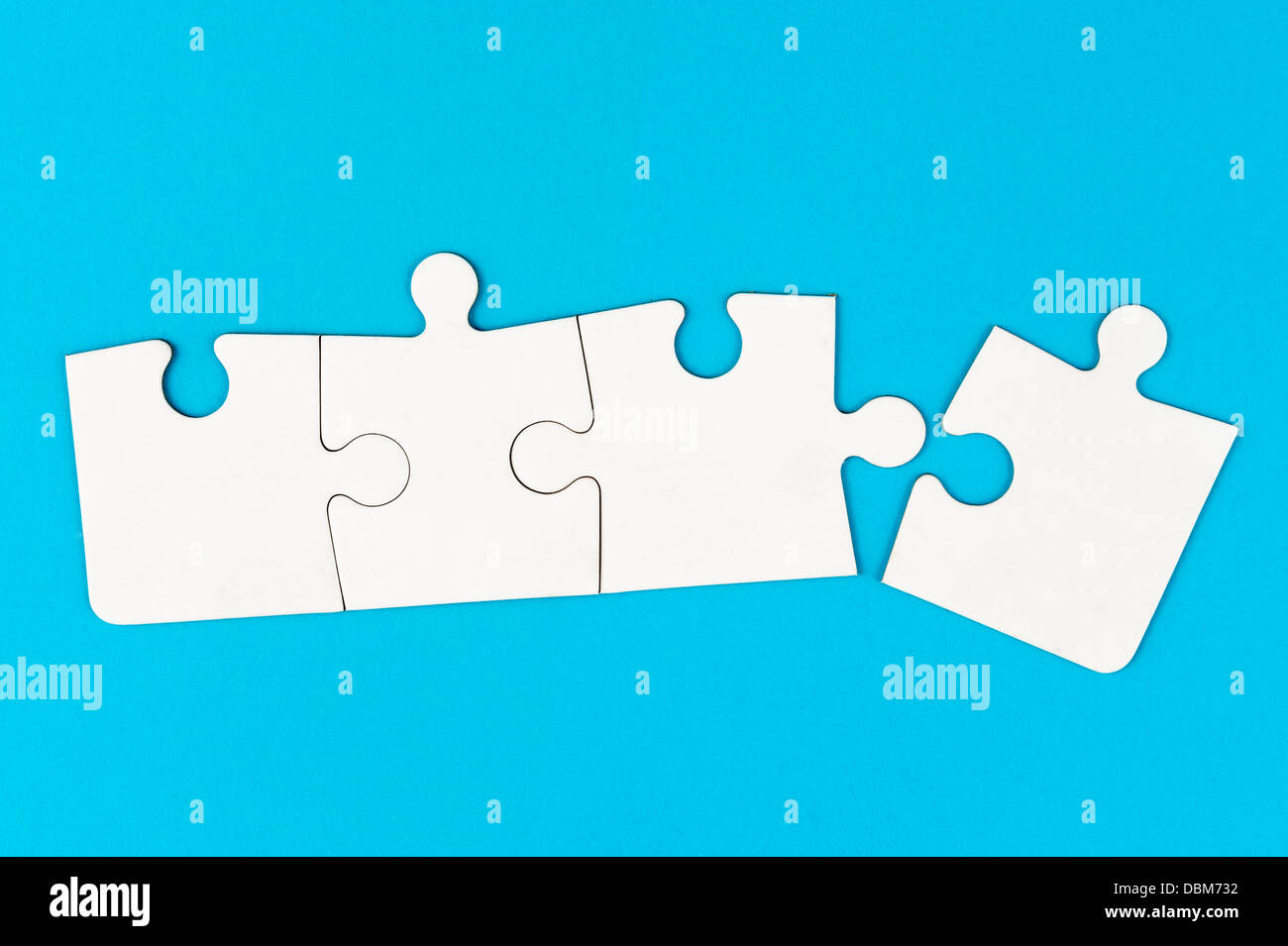 Group of white paper jigsaw puzzles Stock Photo Alamy