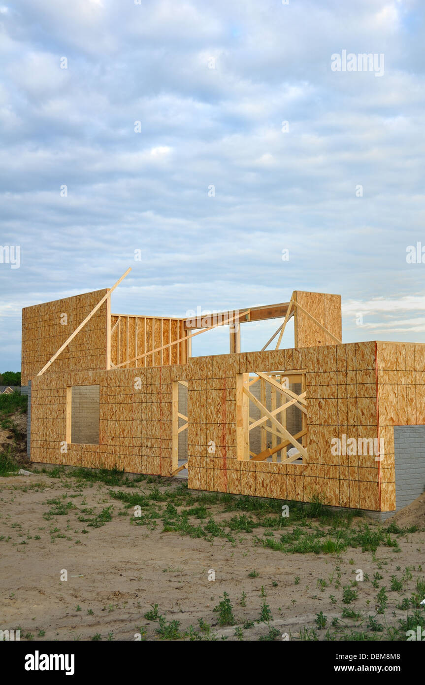 Timber-frame building / pre-fabricated house under construction Stock Photo