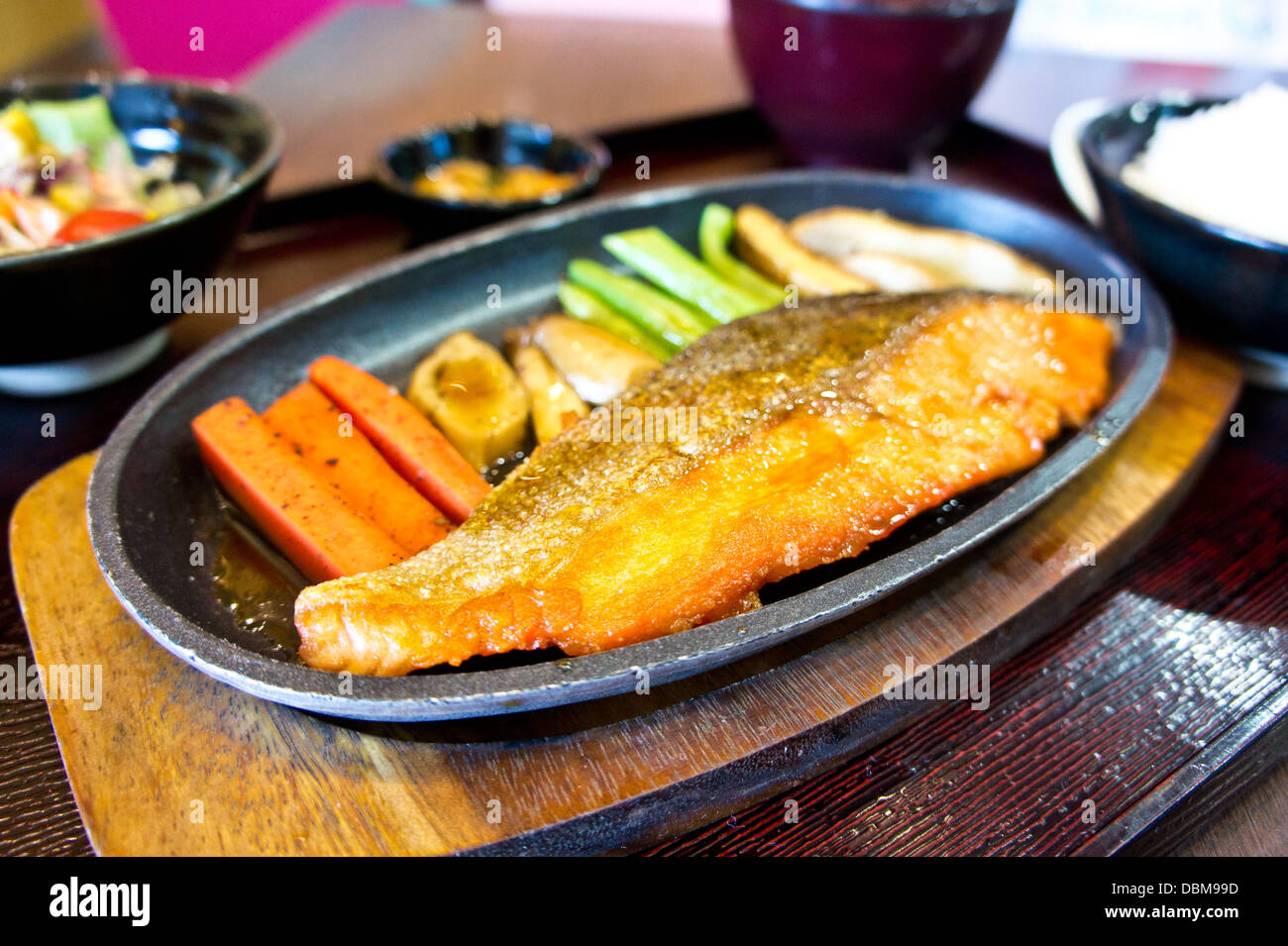 The grilled salmon steak serve in hot plate Stock Photo Alamy
