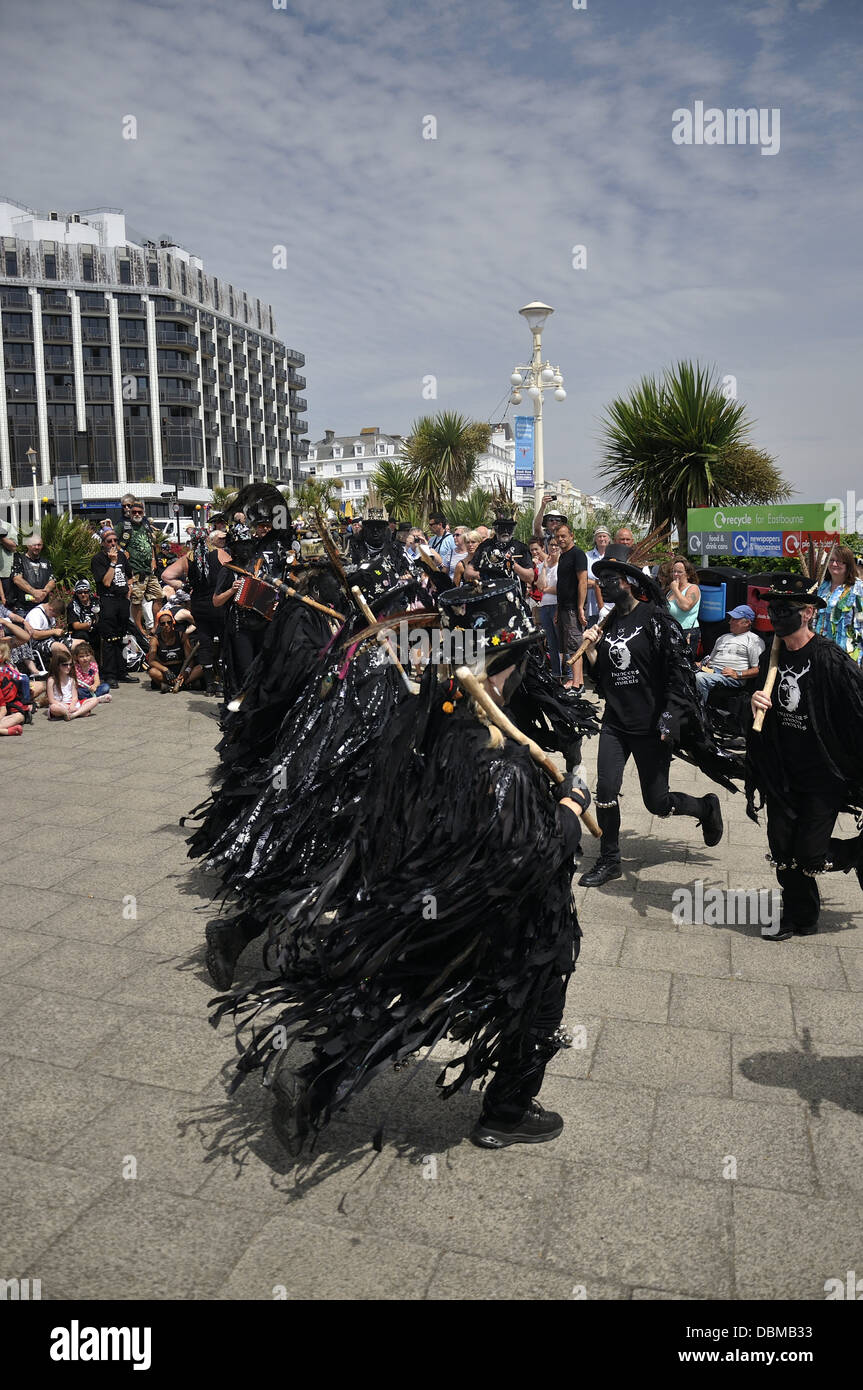 Hunters Moon morris dancers on sea front at Eastbourne Lammas Festival 2013 Stock Photo