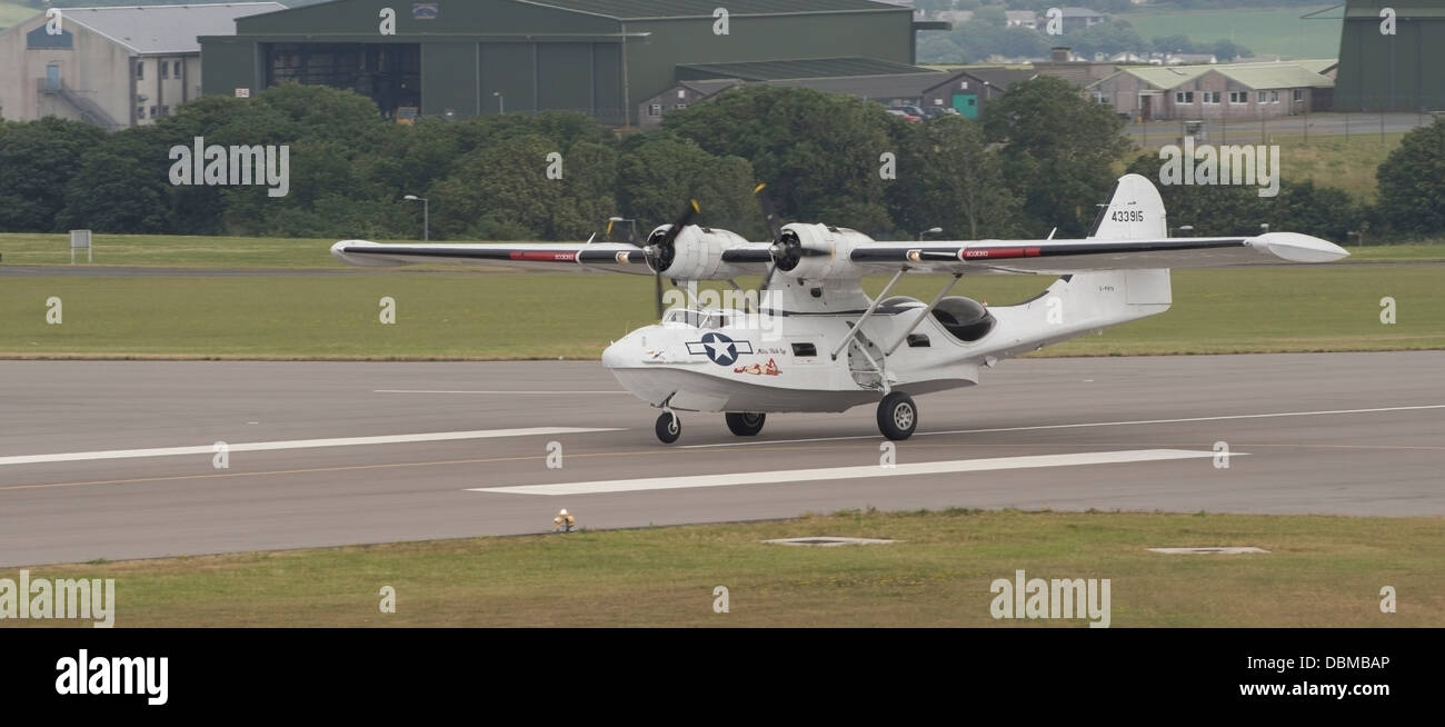 Catalina Flying Boat taxis on runway  post landing at RNAS Culdros (c) Bob Sharples/Alamy Stock Photo