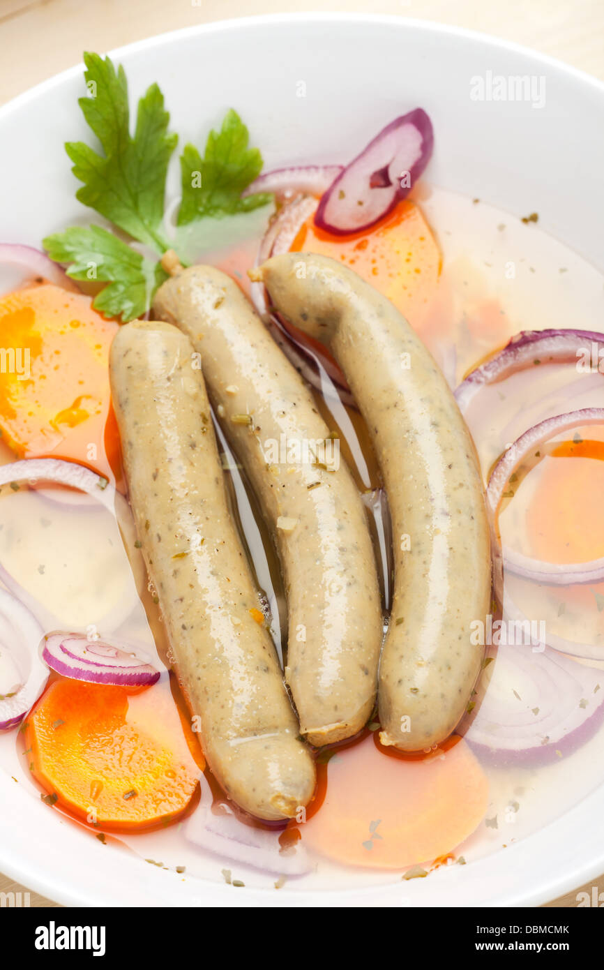 cooked bavarian sausages in a soup Stock Photo Alamy