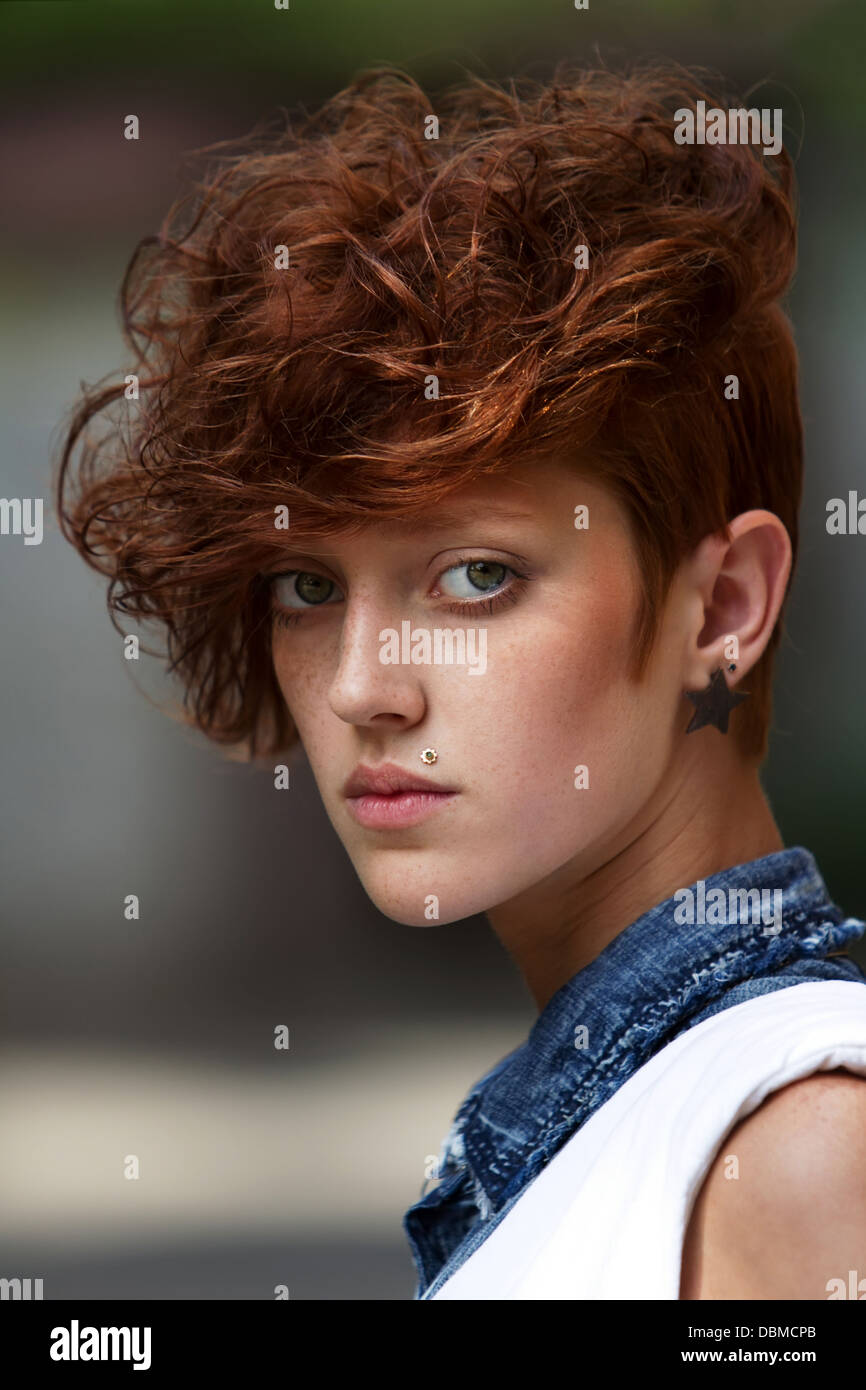 Fashionable Teenage Hipster Girl With Lip Ring Piercing And Spiked