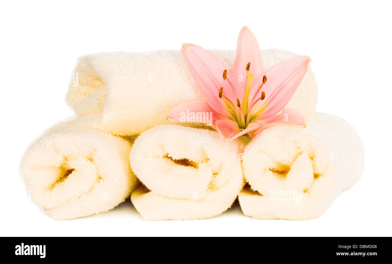 White towels with flower on isolated background Stock Photo