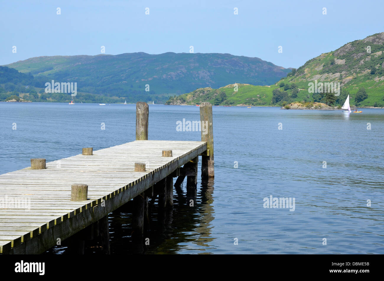 Timber jetty or pier at Gelnridding on the shores of Ullswater, in the Lake District Stock Photo