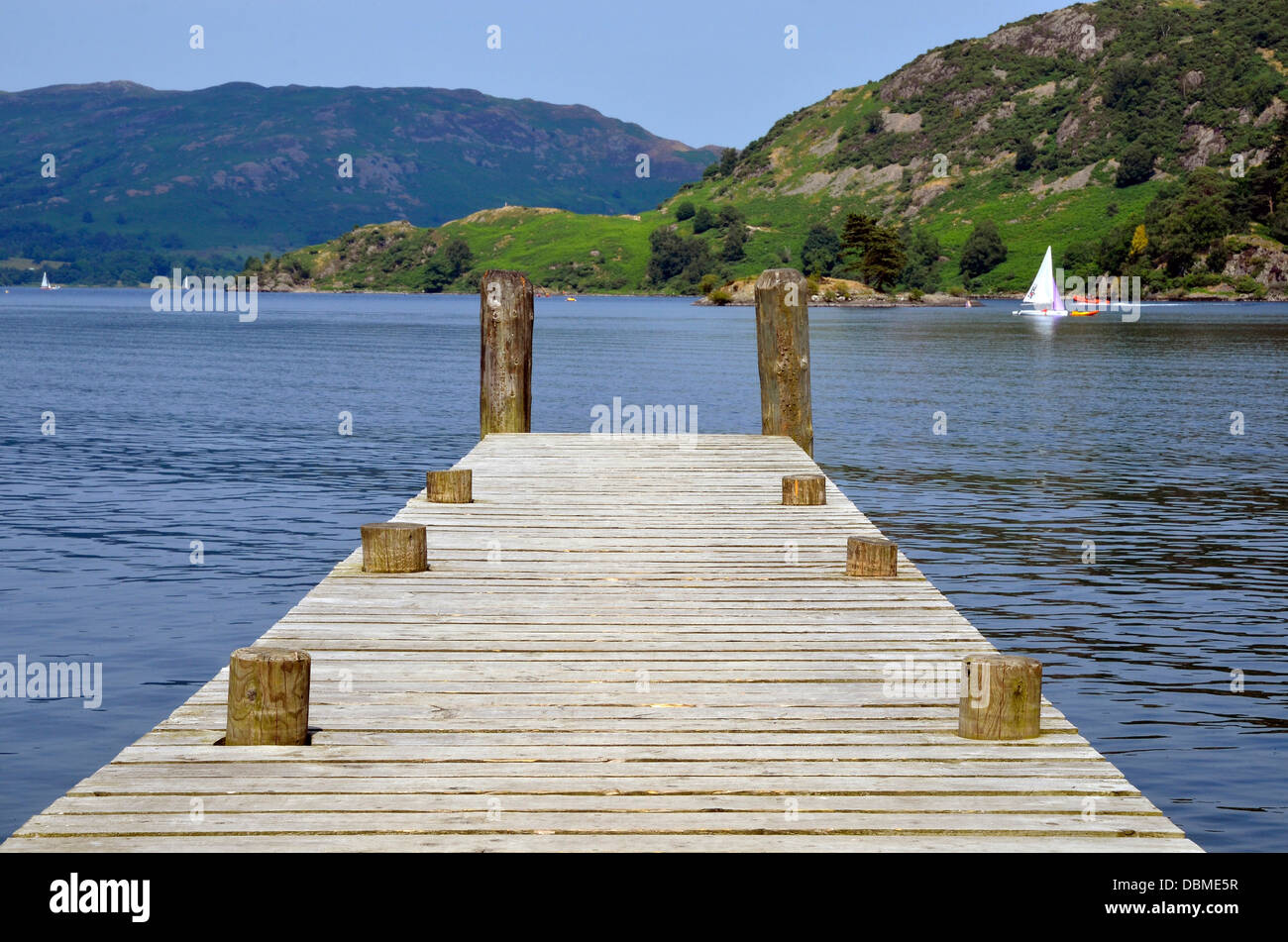 Timber jetty or pier at Gelnridding on the shores of Ullswater, in the Lake District Stock Photo