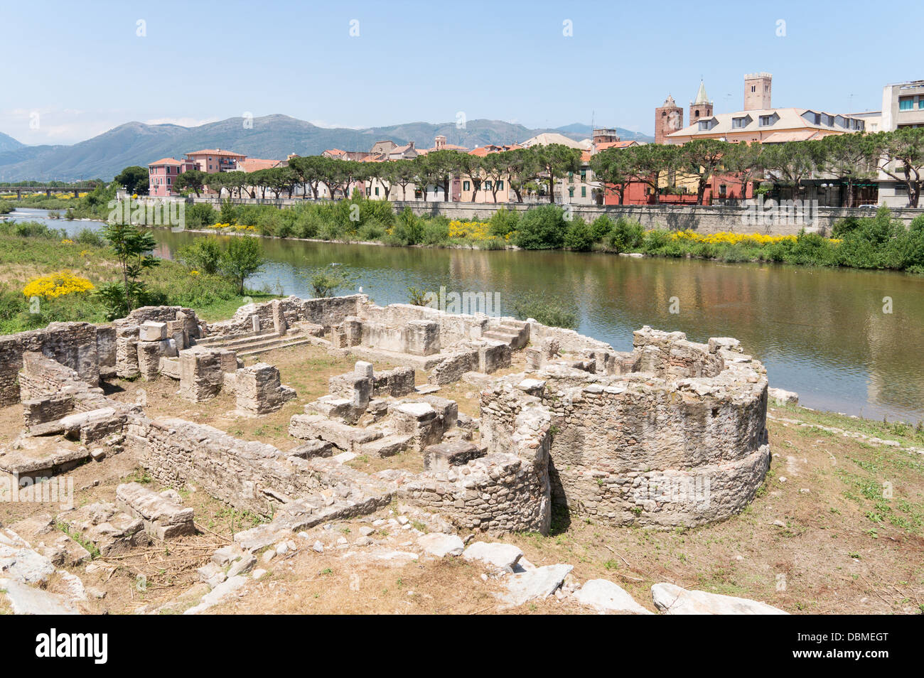 View of Albenga seen across the river Centa with Roman remains in foreground, northern Italy, Europe Stock Photo