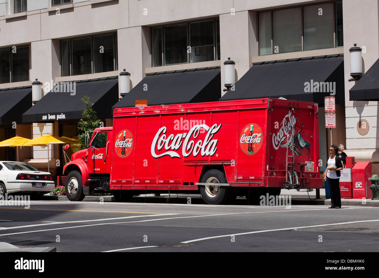 Coca Cola delivery truck parked in front of office building - USA Stock Photo