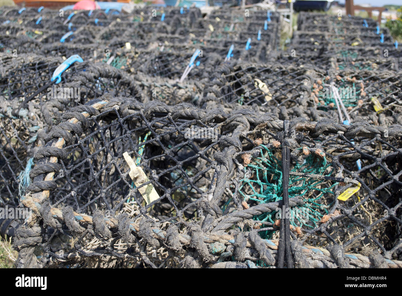 Lobster pots in rows Stock Photo