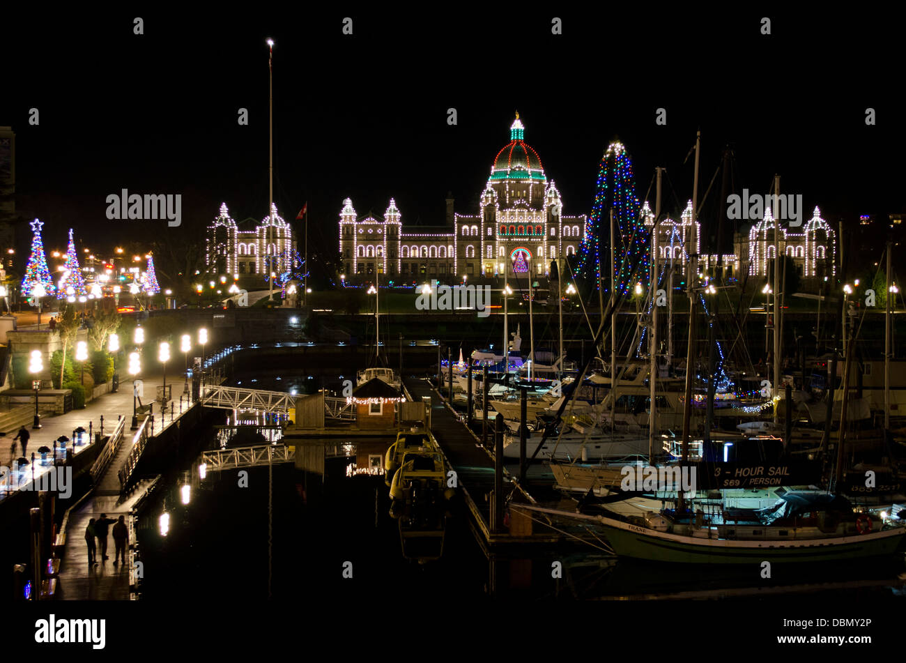 Parliament buildings and the inner harbour of Victoria, British Columbia, colourfully lit up for the Christmas season. Stock Photo