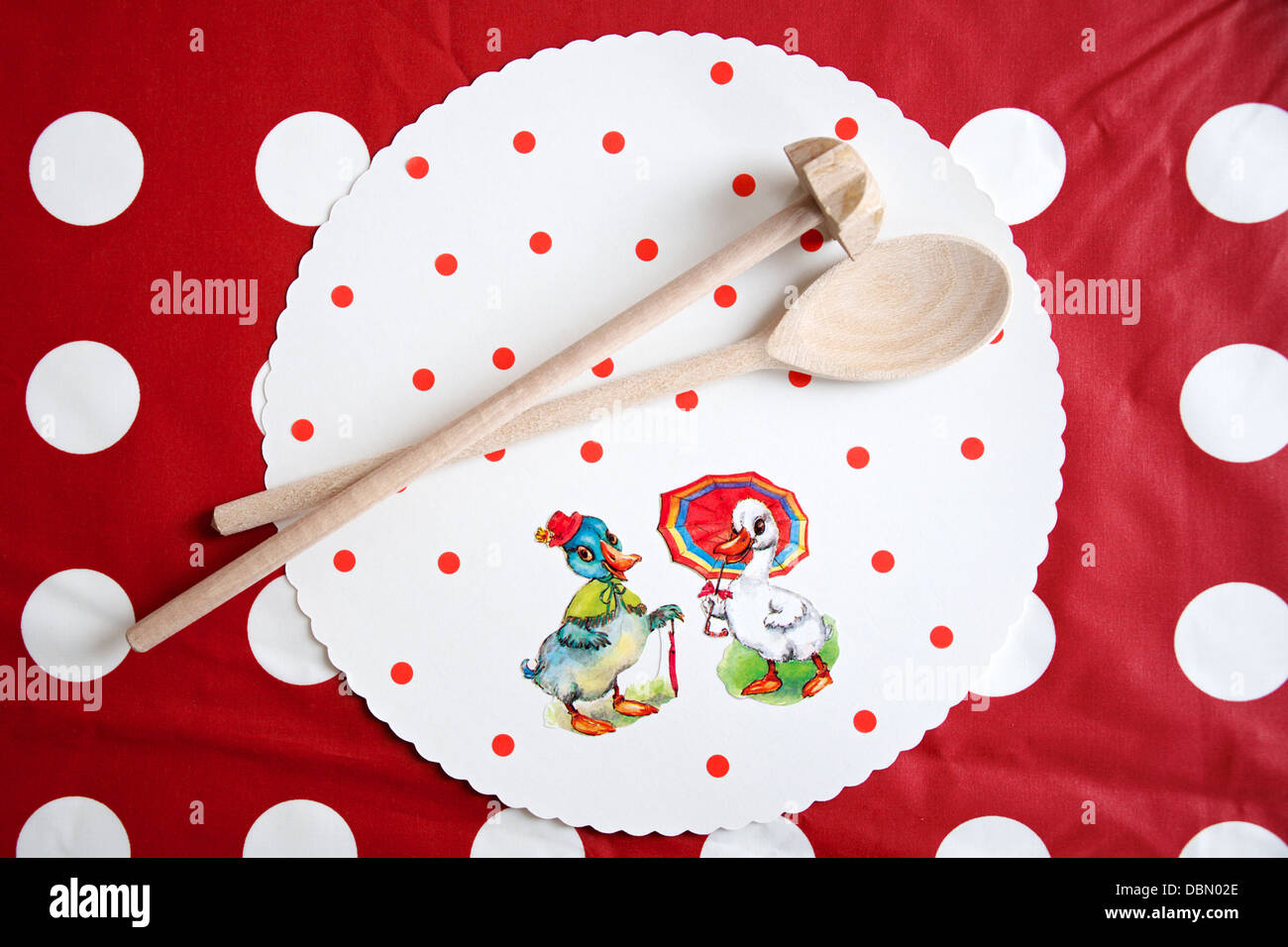 Wooden spoons on place mat, Munich, Bavaria, Germany Stock Photo