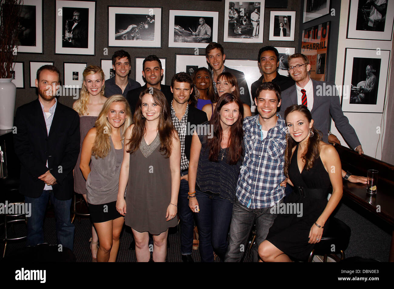 Back row: Christopher Dimond, Kate Hennies, Matt Doyle, Zak Resnick, Kyle Dean Massey, Patina Miller, Anderson Davis, Julia Murney, Jose Llana, and Michael Kooman  Front Row: Lora Lee Gayer, Phoebe Strole, Allison Case, Jeremy Jordan, and Laura Osnes  Broadway at Birdland concert / CD Release: 'Out of Our Heads - The Music of Kooman and Dimond' at Birdland Jazz Club - After Party.  Stock Photo