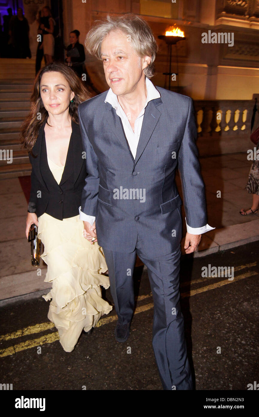 Irish composer Bob Geldof and his wife upon arrival to the cocktail  reception for the inauguration of the new Louis Vuitton house on the  Champs-Elysees in Paris, France, on October 9, 2005