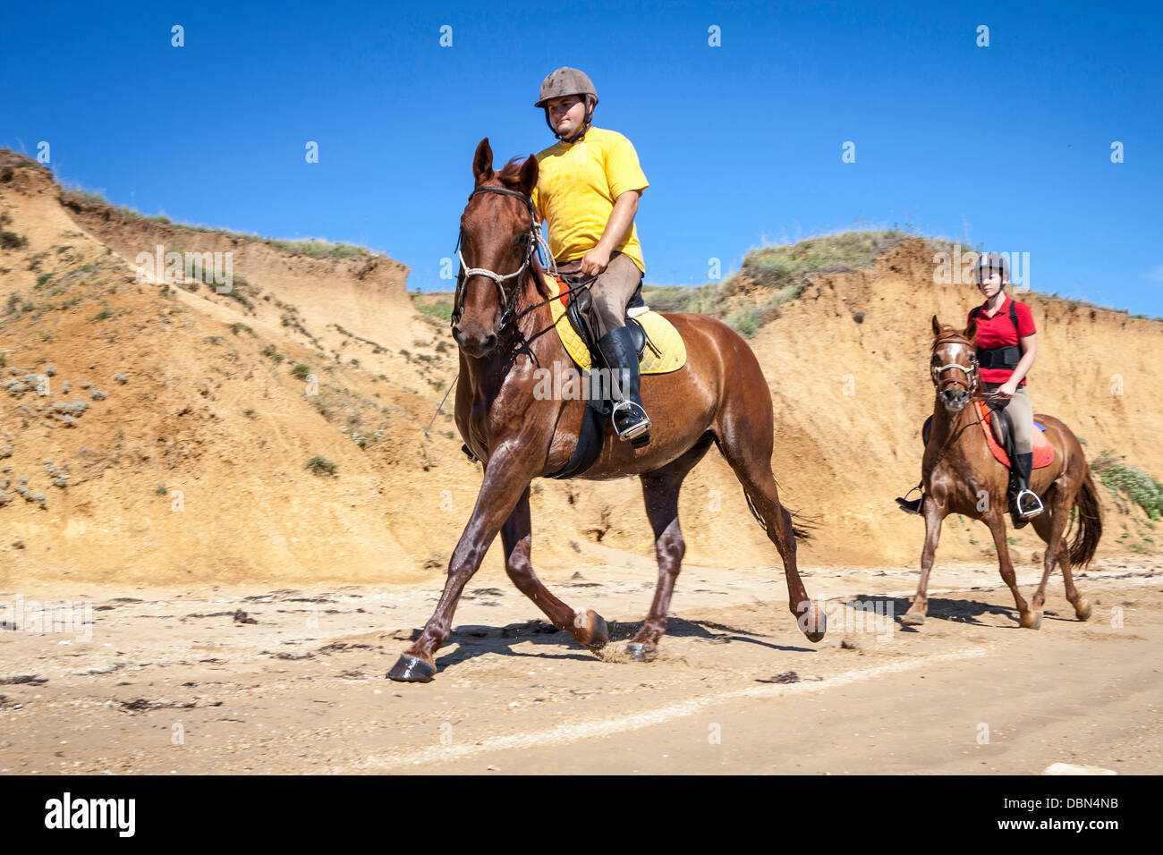 Couple On Berach Riding Horses, Croatia, Dalmatia, Europe Stock Photo