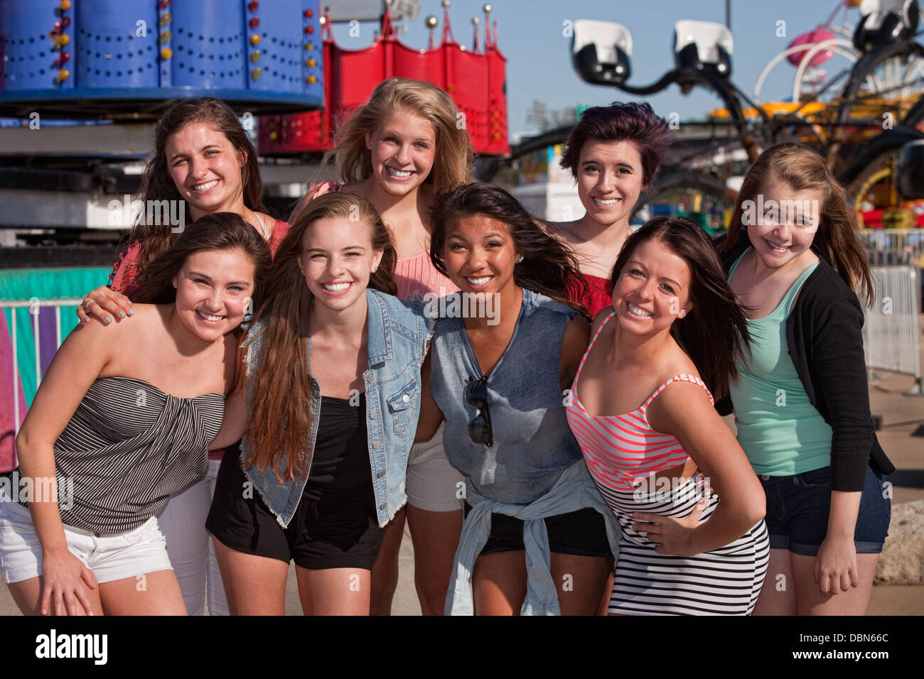 Friends at an Amusement Park Stock Photo - Alamy