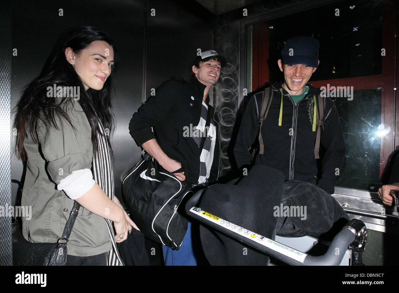 Katie McGrath, Bradley James and Colin Morgan The stars of international smash hit BBC television show 'Merlin' arrive at LAX on a flight from London Heathrow which was delayed over 4 hours from its scheduled arrival time. Los Angeles, California - 24.07.11 Stock Photo