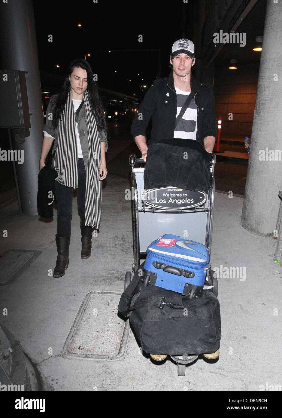 Katie McGrath and Bradley James The stars of international smash hit BBC television show 'Merlin' arrive at LAX on a flight from London Heathrow which was delayed over 4 hours from its scheduled arrival time. Los Angeles, California - 24.07.11 Stock Photo