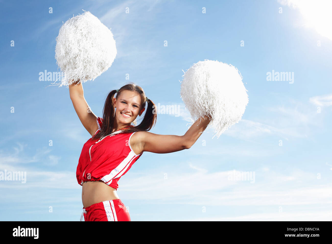 Young female cheerleader Stock Photo - Alamy