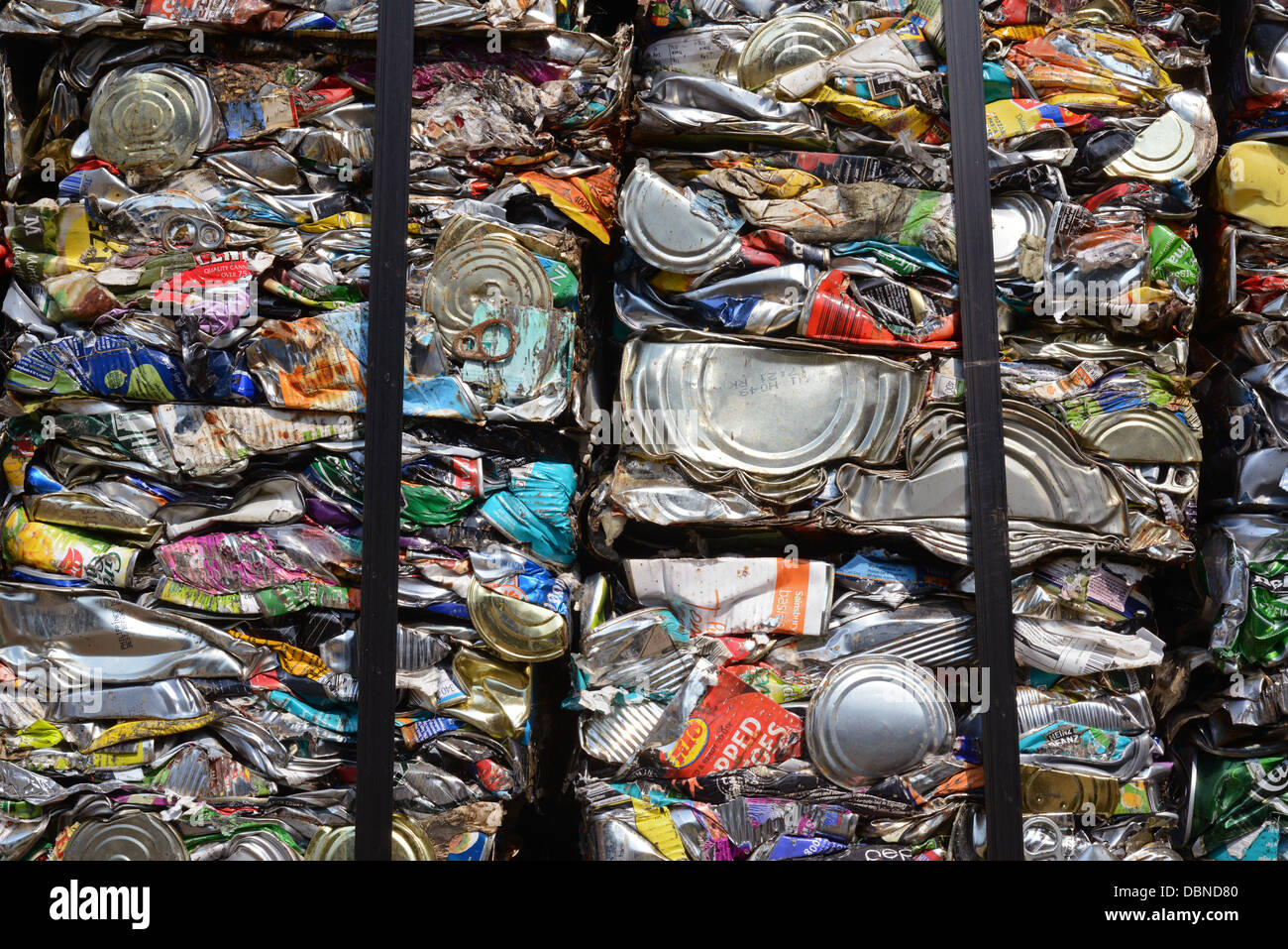 bale of flattened tin cans at scrapyard united kingdom Stock Photo