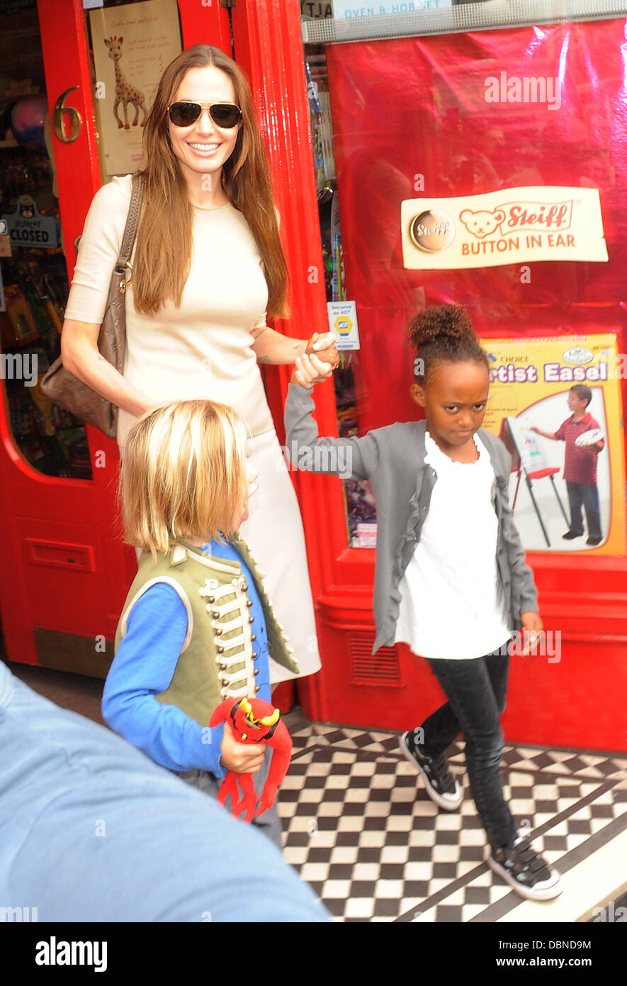 Angelina Jolie takes her children Zahara Pitt and Shiloh Pitt to the Toy Station in Richmond London, England - 26.07.11 Stock Photo