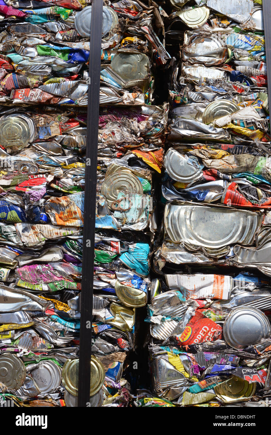 bale of flattened tin cans at scrapyard united kingdom Stock Photo