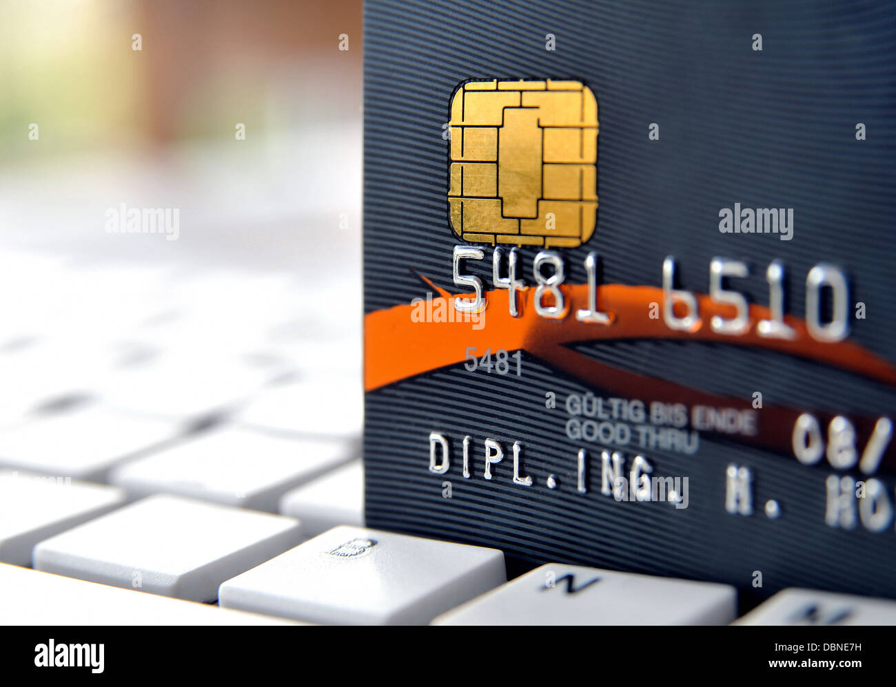 Black credit card on a computer keypad Stock Photo Alamy