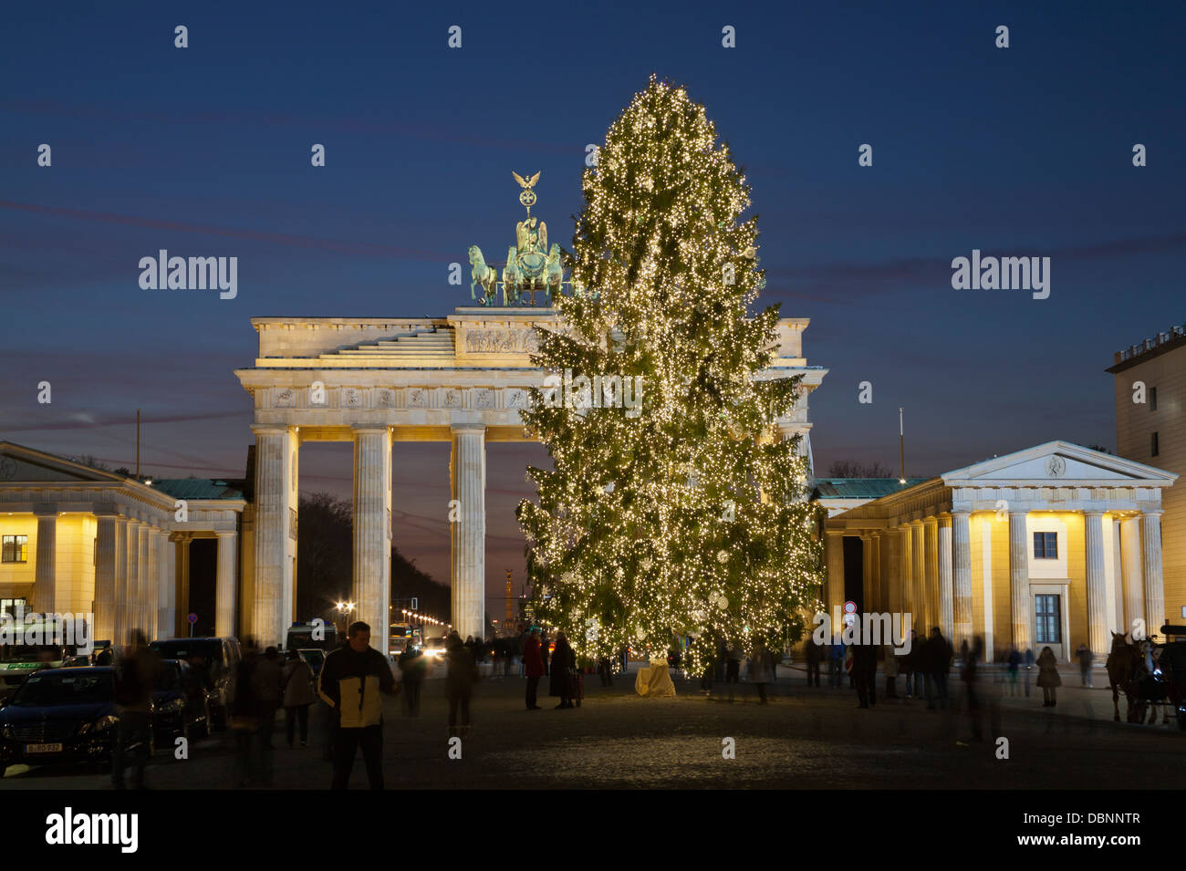 Illuminated Christmas tree and Brandenburg Gate on square Pariser Platz