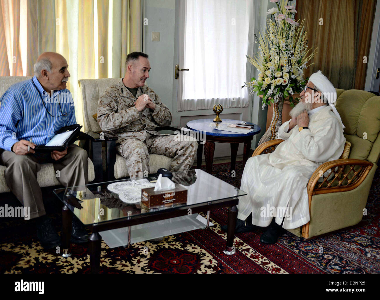 US Marine Corps Gen. Joseph F. Dunford Jr., commander of International Security Assistance Force visits Sebghatullah Mojaddedi, former president of Afghanistan and the Chairman of the Upper House of Parliament July 30, 2013 in Kabul, Afghanistan. Stock Photo
