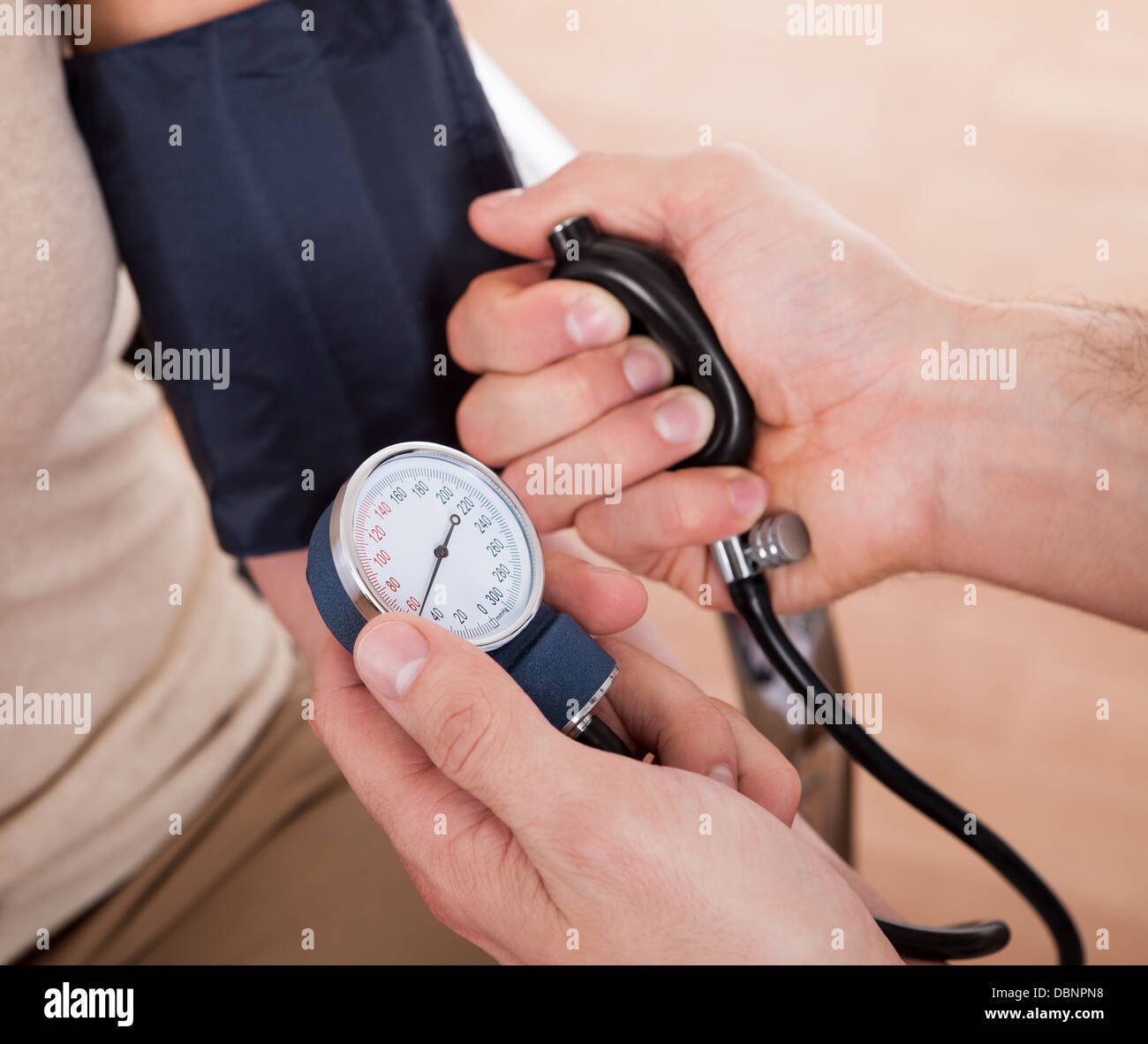 Doctor Checking Blood Pressure Stock Photo Alamy doctor-checking-blood-pressure-stock-photo-alamy