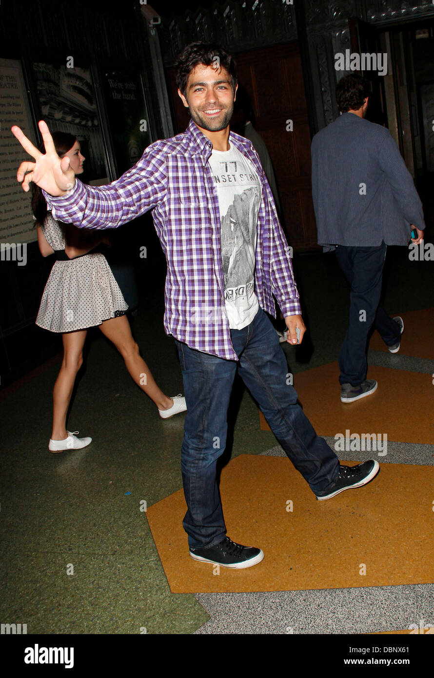 Adrian Grenier arrives at a Deerhunter concert with a female companion   Los Angeles, California - 09.08.11 Stock Photo