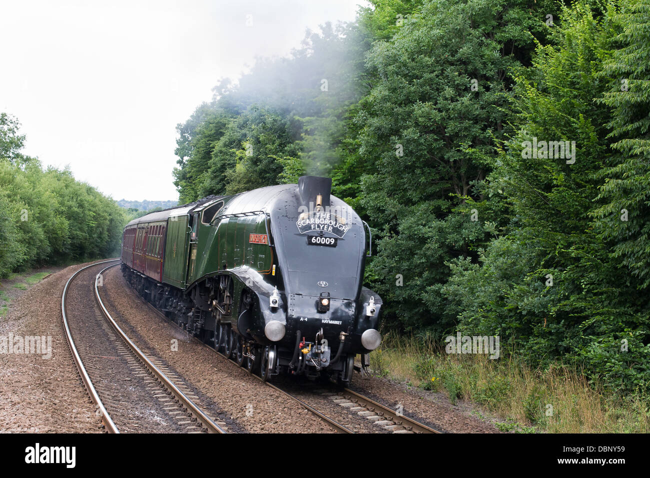 Steam pulling a passenger train on the mainline Huddersfield