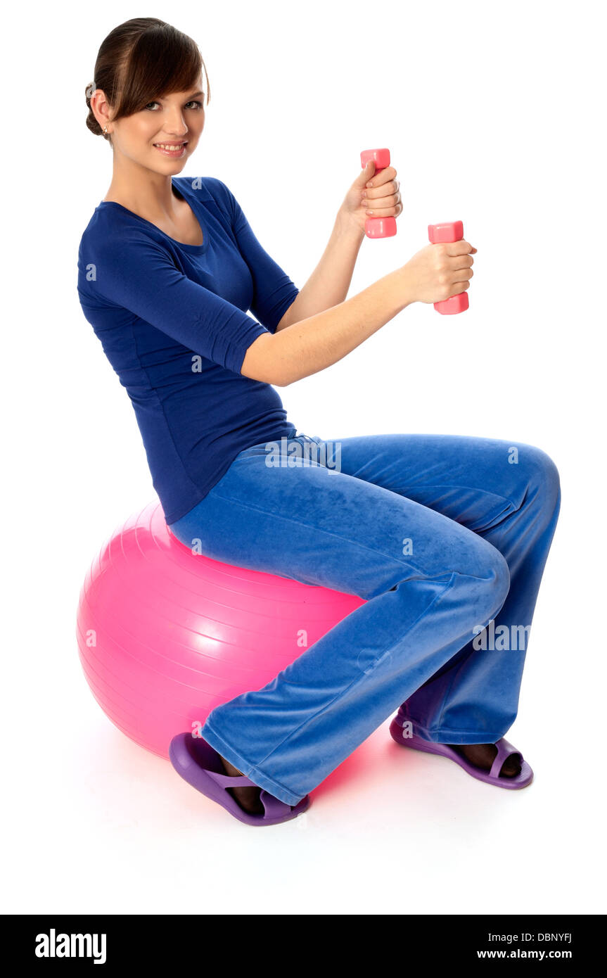Exercises with dumbbells on a gymnastic ball Stock Photo Alamy