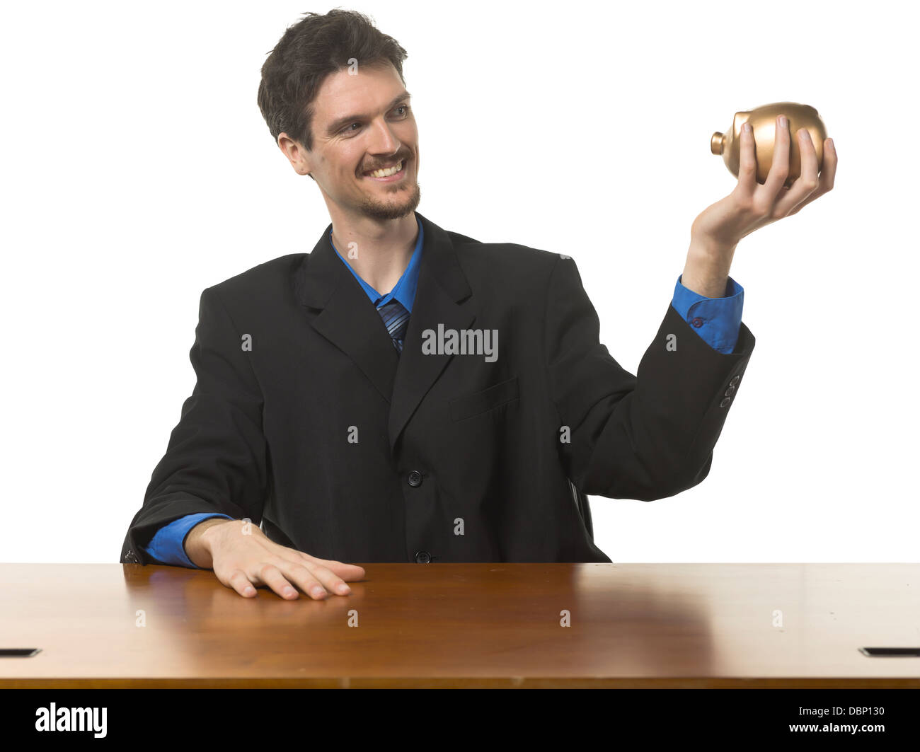 happy businessman holding piggy bank Stock Photo - Alamy