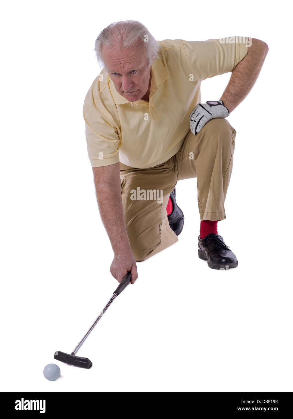 senior pushing the golf ball Stock Photo Alamy