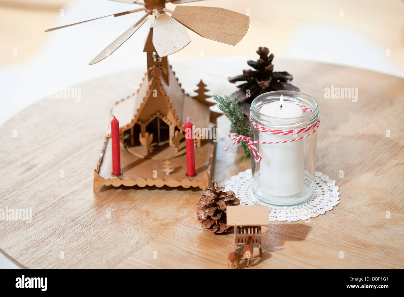 Christmas decoration, fir cones, pyramid and candle, Munich, Bavaria, Germany Stock Photo