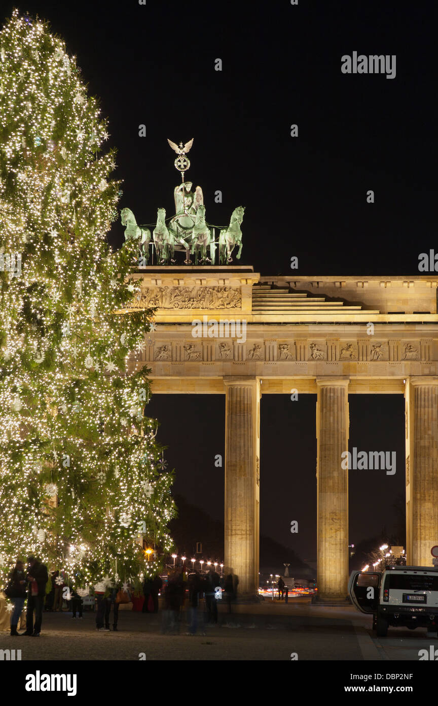 Illuminated Christmas tree and Brandenburg Gate on square Pariser Platz