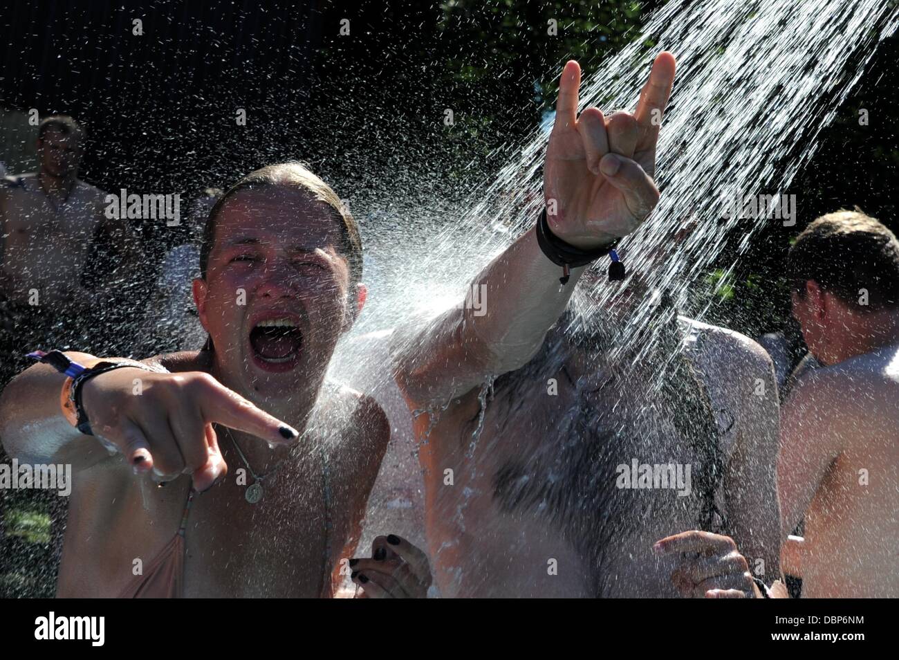 Wacken, Germany. 01st Aug, 2013. People shower at Wacken Open Air