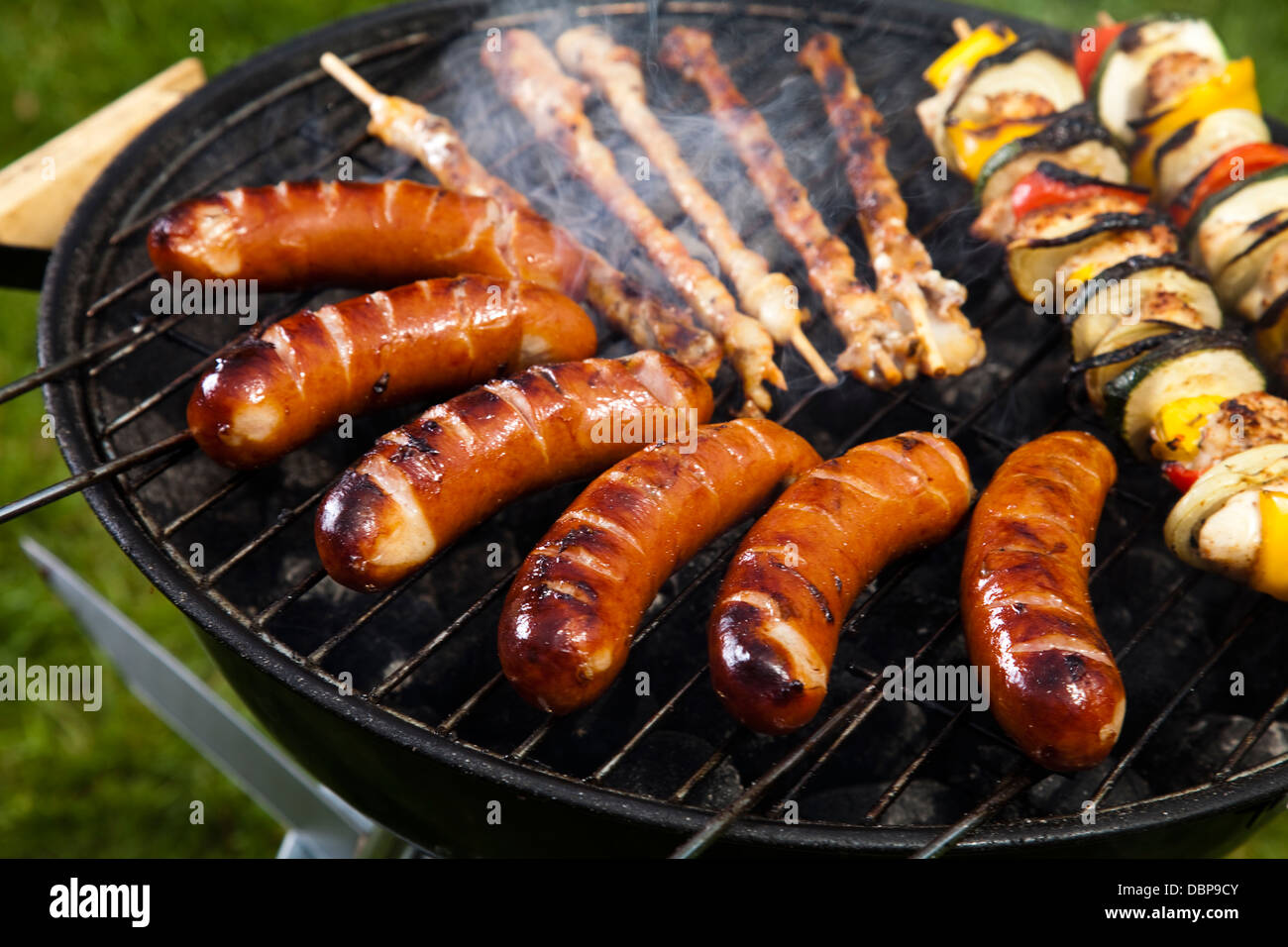 Cooking on the barbecue grill Stock Photo Alamy