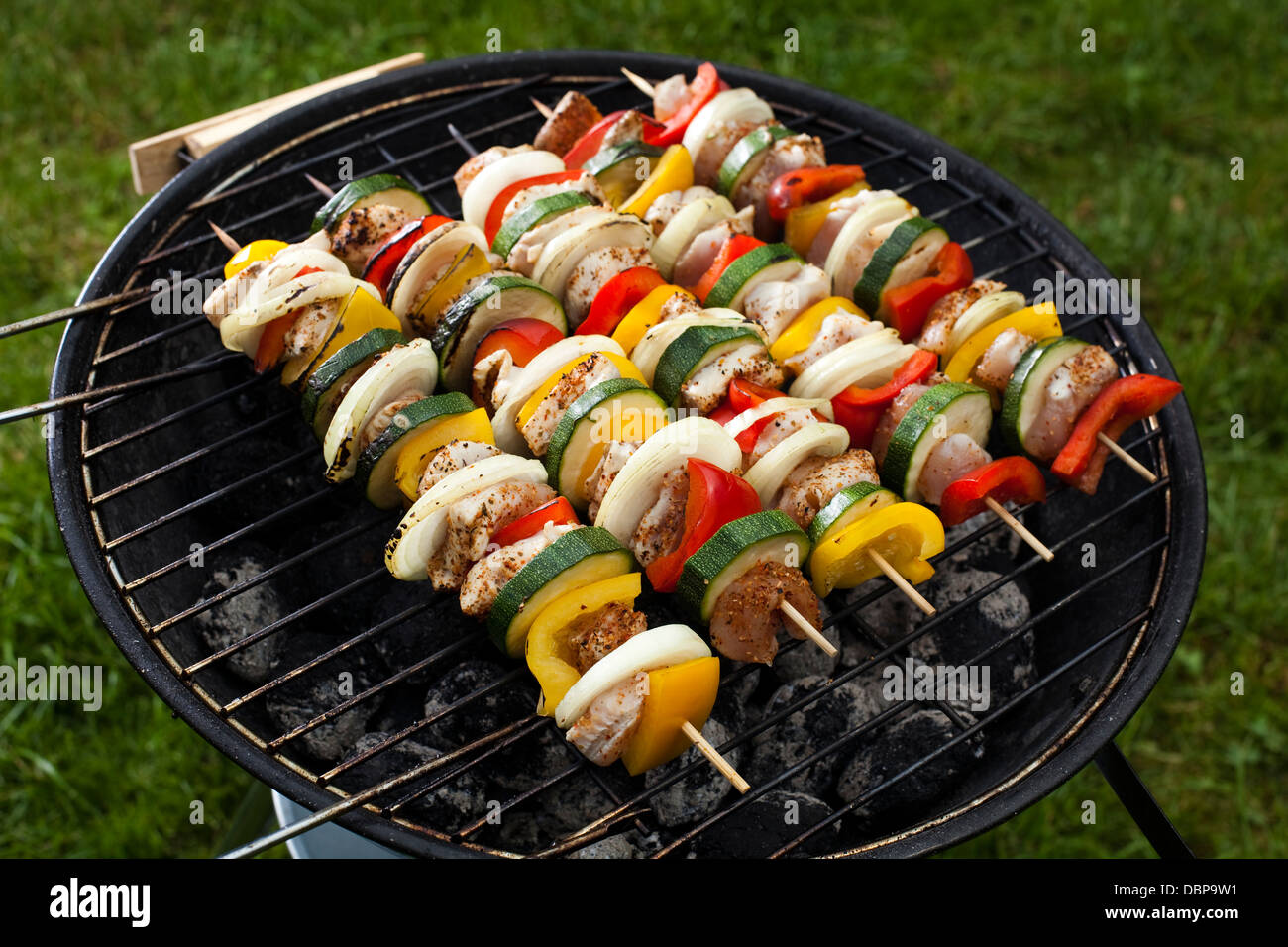 Skewers, Grill background Stock Photo Alamy