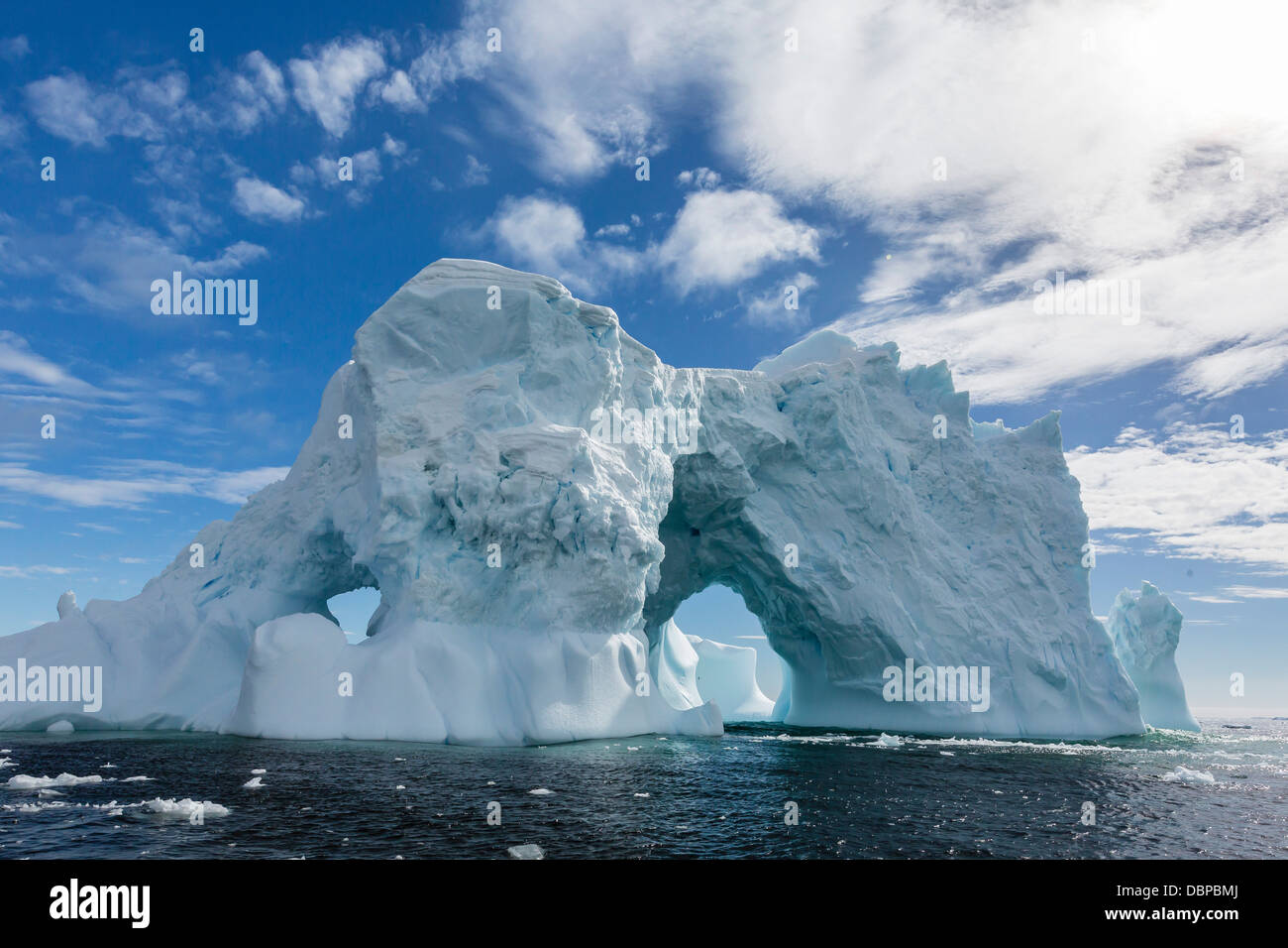 Huge Arched Iceberg Near Petermann Island Western Side Of The huge-arched-iceberg-near-petermann-island-western-side-of-the