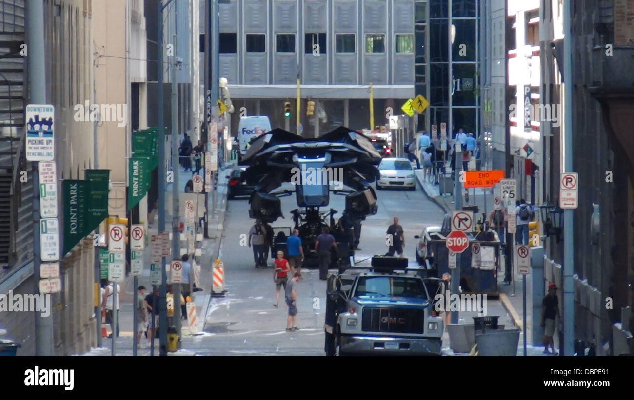 The Batplane is transported through a scene with a Batman figure in the  cockpit on the set of the new Batman film 'Dark Knight Rises' filming in  Pittsburgh Pennsylvania, USA 