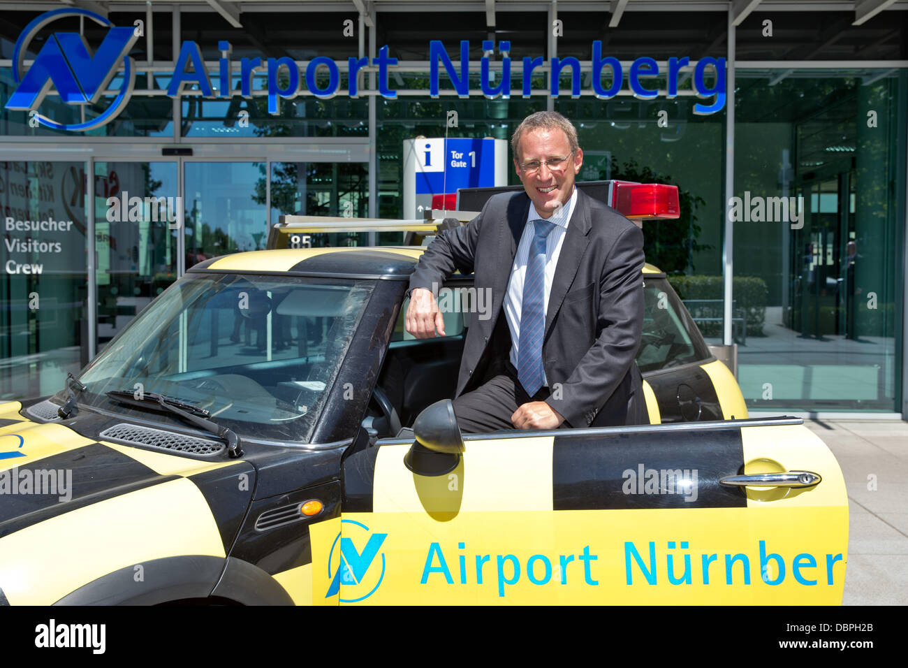 New CEO of Nuremberg Airport Michael Hupe stands at the airport in Nuremberg, Germany, 02 August 2013. The 49 year-old former manager of Dresden Airport was introduced by the supervisory board earlier. Photo: DANIEL KARMANN Stock Photo