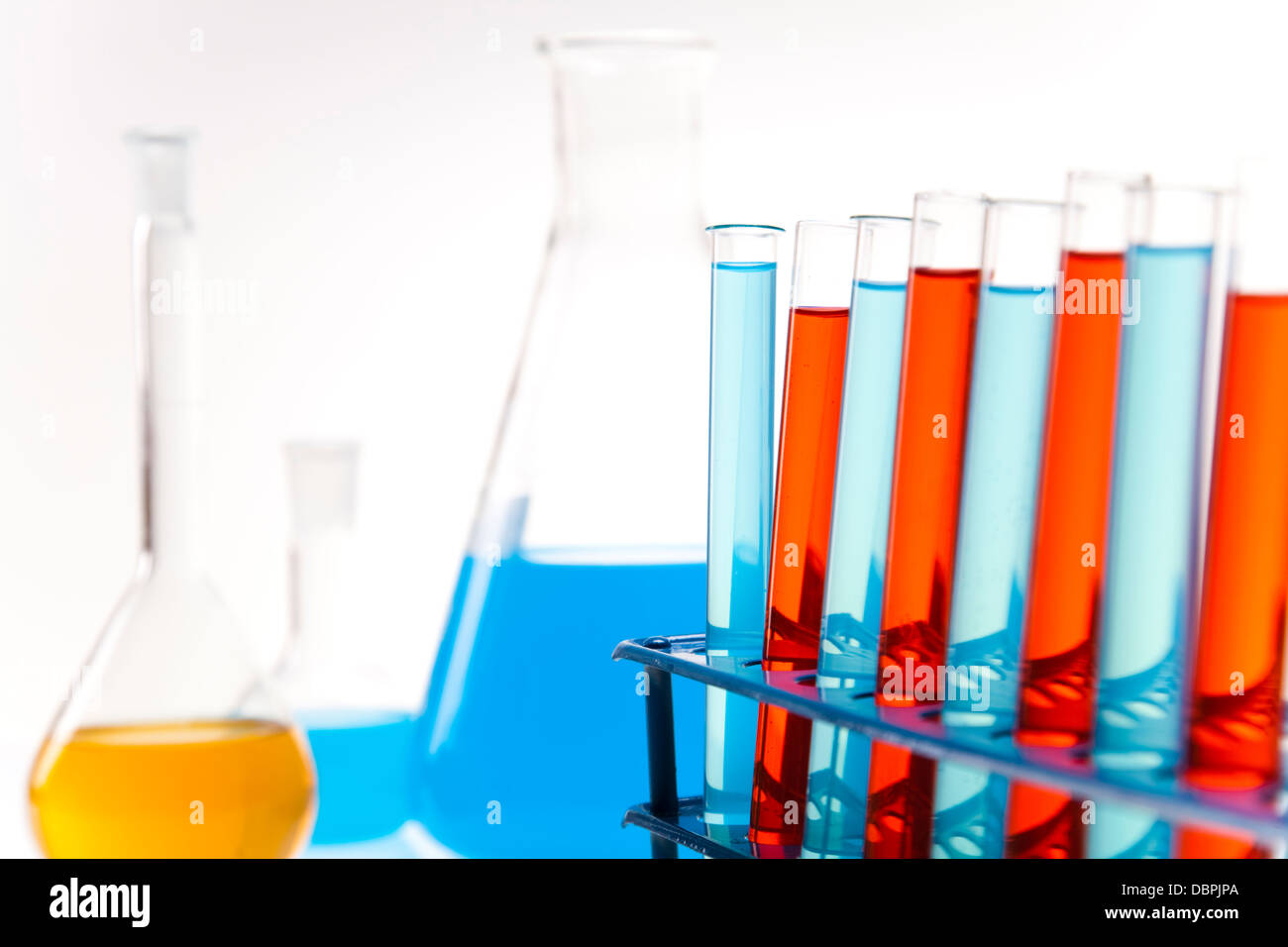 Laboratory glass containing liquid color Stock Photo