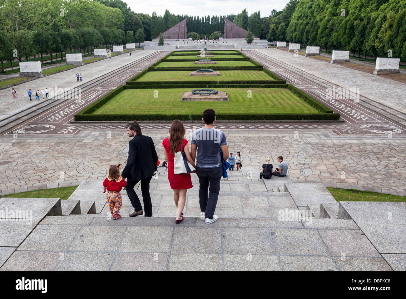 People walk down steps of Soviet War memorial for 5000 soldiers who died in WW2, Treptow, Berlin Stock Photo