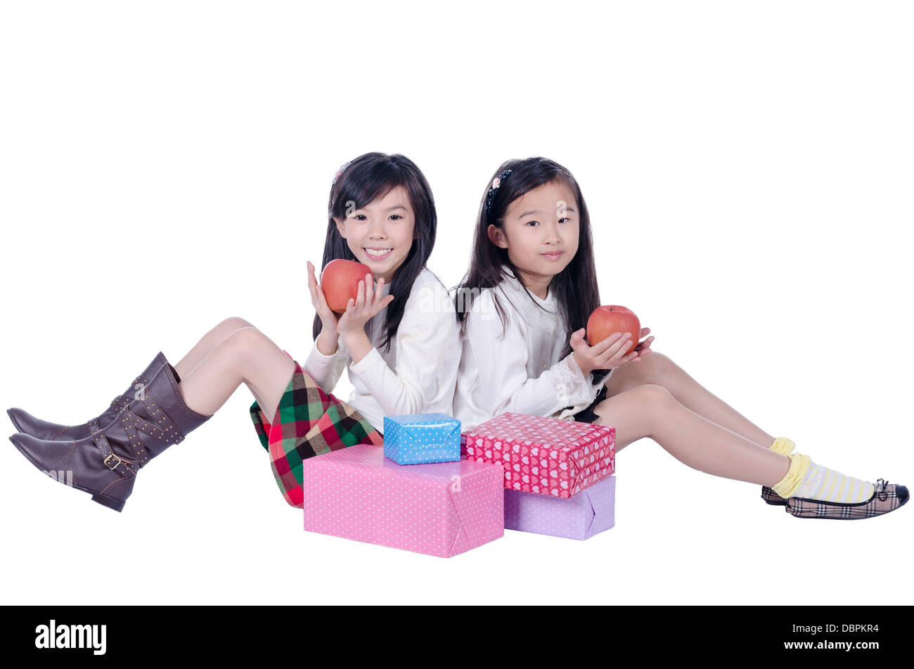 Happy children eating apple Stock Photo