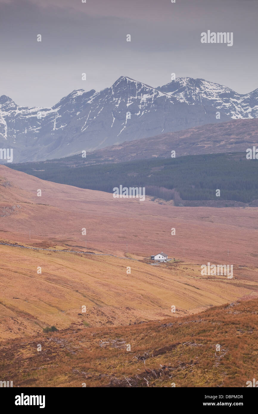 A lonely house sits in the shadow of the Cuillins on the Isle of Skye ...